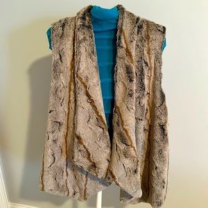 Like new faux fur vest in size large